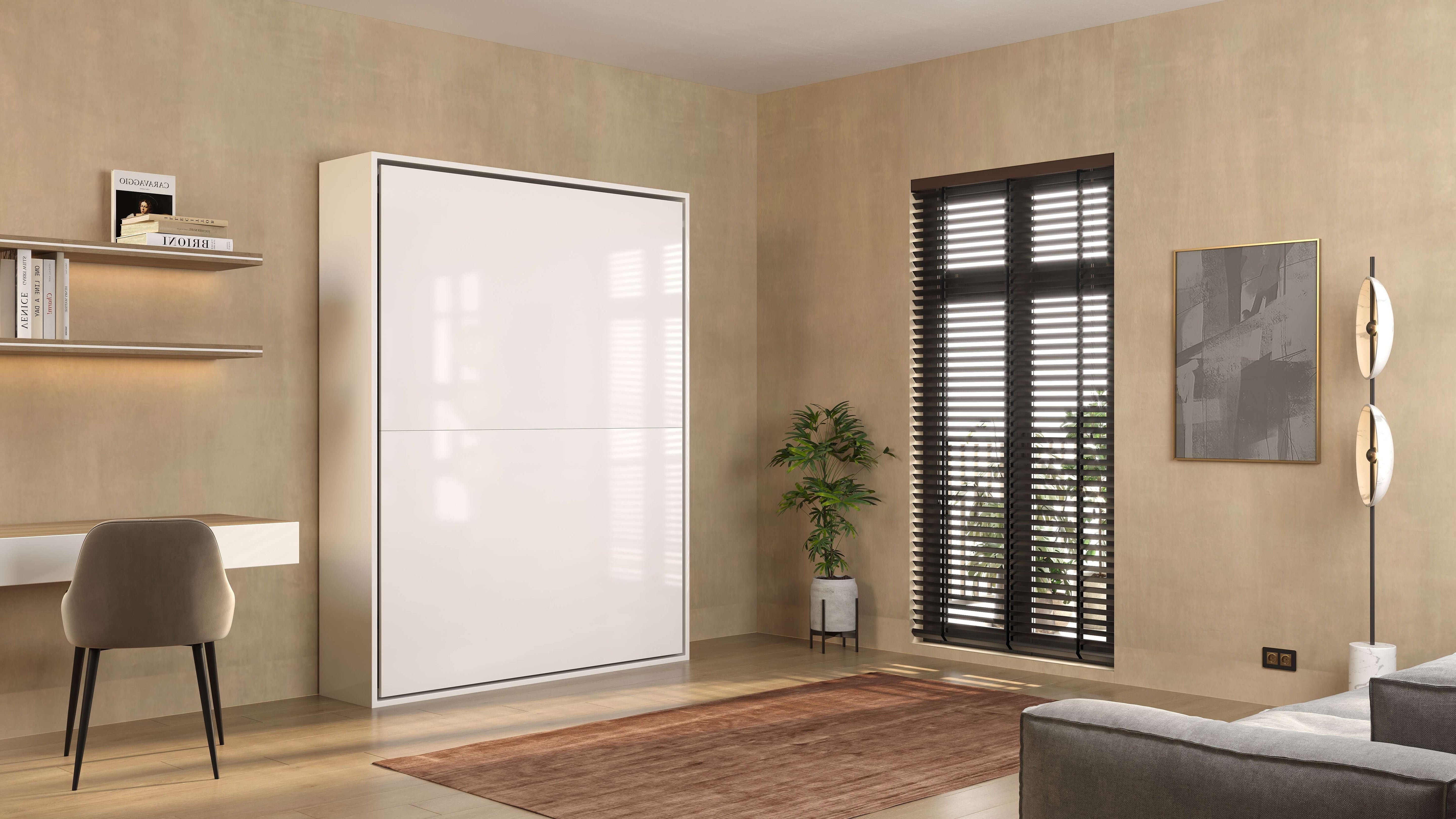 Stijlvol wit opklapbed in moderne woonkamer, naast bureau en planten, met natuurlijk licht door raampartij.