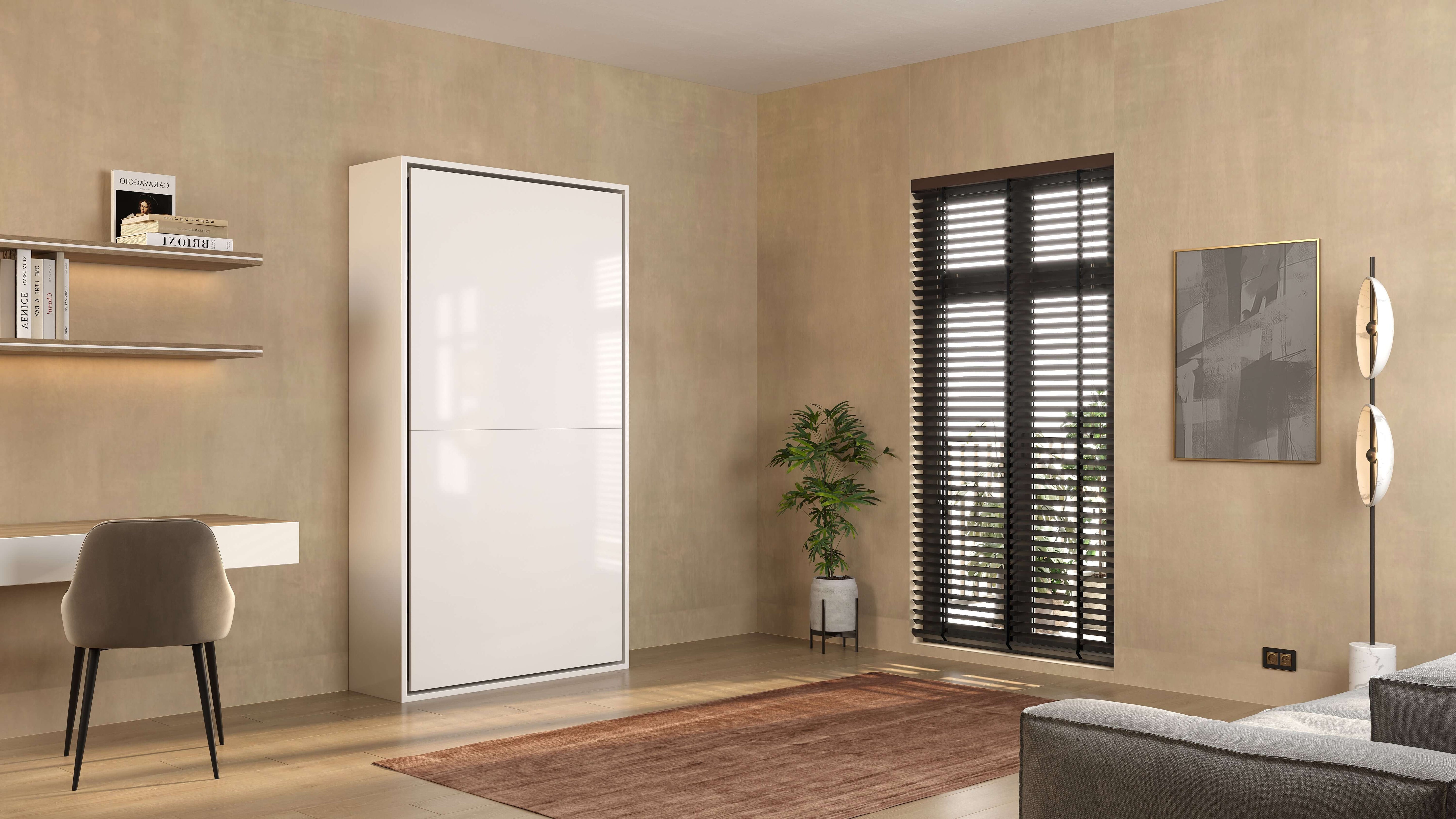 Stijlvol wit opklapbed in compacte woonkamer met bureau en planten, perfect voor ruimtebesparing.